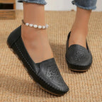 Women's handmade stitching Gommino casual shoes by Nova Mart, featuring soft leather with detailed stitching and flexible sole.