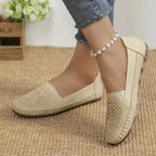 Women's handmade stitching Gommino casual shoes by Nova Mart, featuring soft leather and comfortable slip-on design.