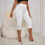 Women's high waist lace patchwork slim cropped pants by Nova Mart, featuring intricate lace details and a fitted silhouette.