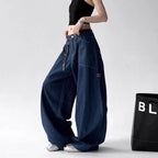 Women's high-waist straight-leg denim jeans by Nova Mart, showcasing classic blue jeans with a fitted waistband and relaxed fit.