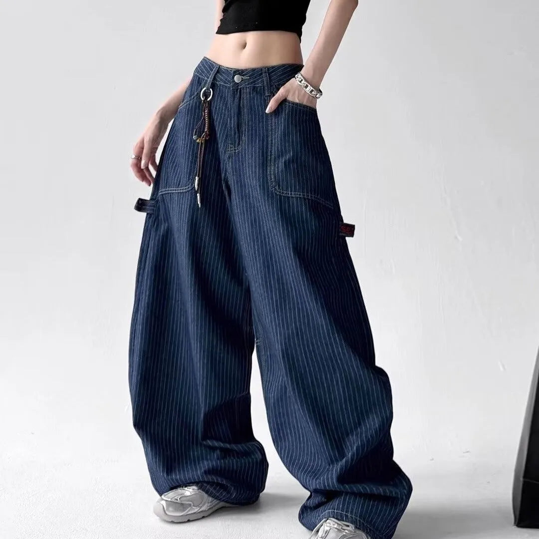 Women's high-waist straight-leg denim jeans by Nova Mart, featuring classic blue denim fabric and a flattering fit.