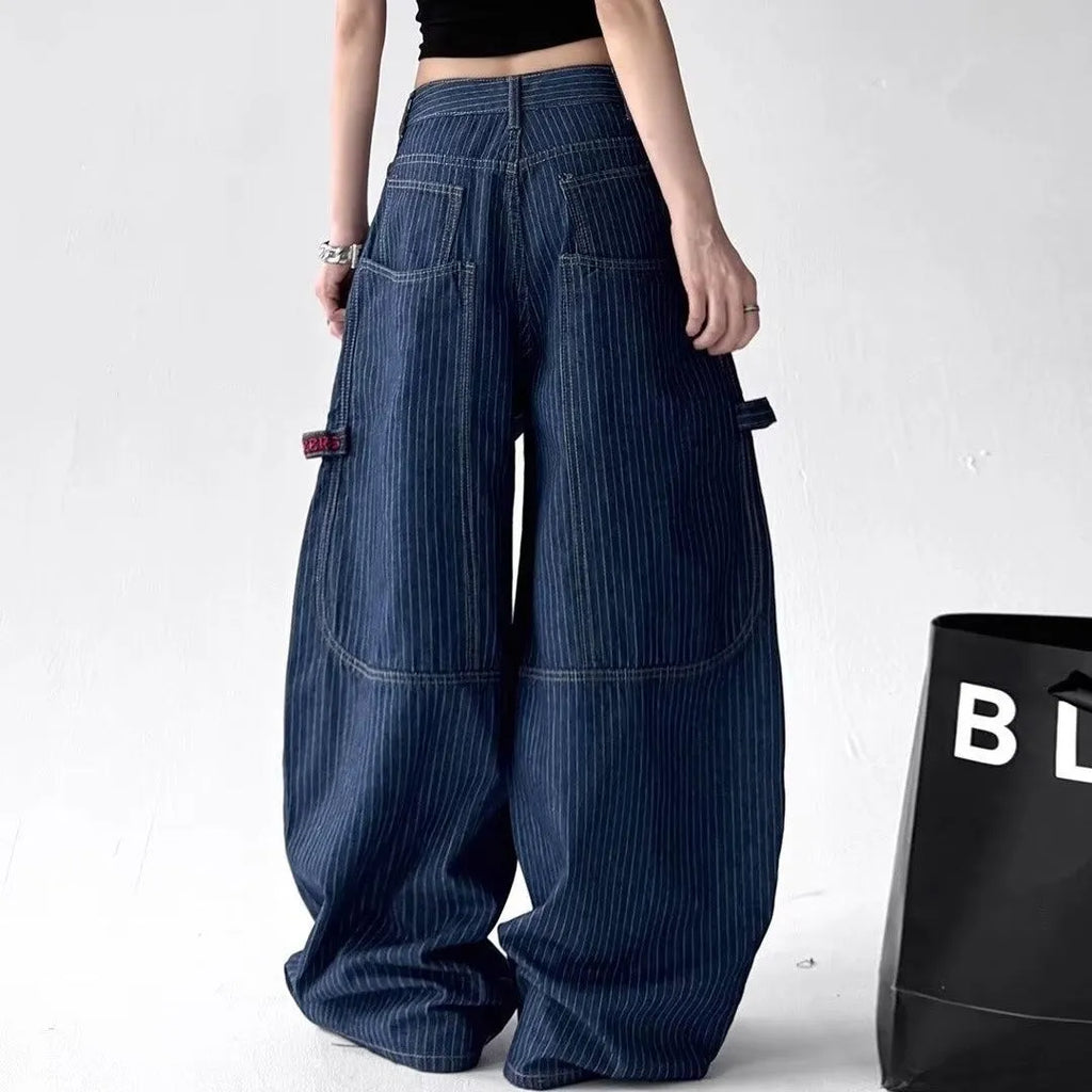 Women’s high-waist straight-leg denim jeans by Nova Mart with classic blue wash and front pockets.