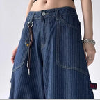 Women's high-waist straight-leg denim jeans by Nova Mart, shown in classic blue with front pockets and belt loops.