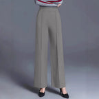 Women's high waist wide-leg casual pants with pockets by Nova Mart, shown in a relaxed fit style with side pockets.