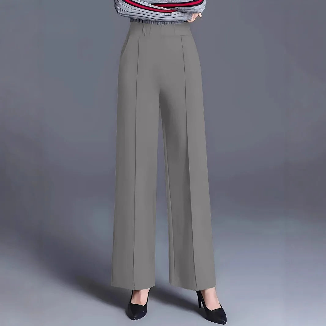 Women's high waist wide-leg casual pants with pockets by Nova Mart, shown in a relaxed fit style with side pockets.