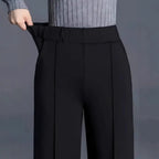 Women's high waist wide-leg casual pants with pockets by Nova Mart, shown in a relaxed fit with side pockets and flowy fabric.