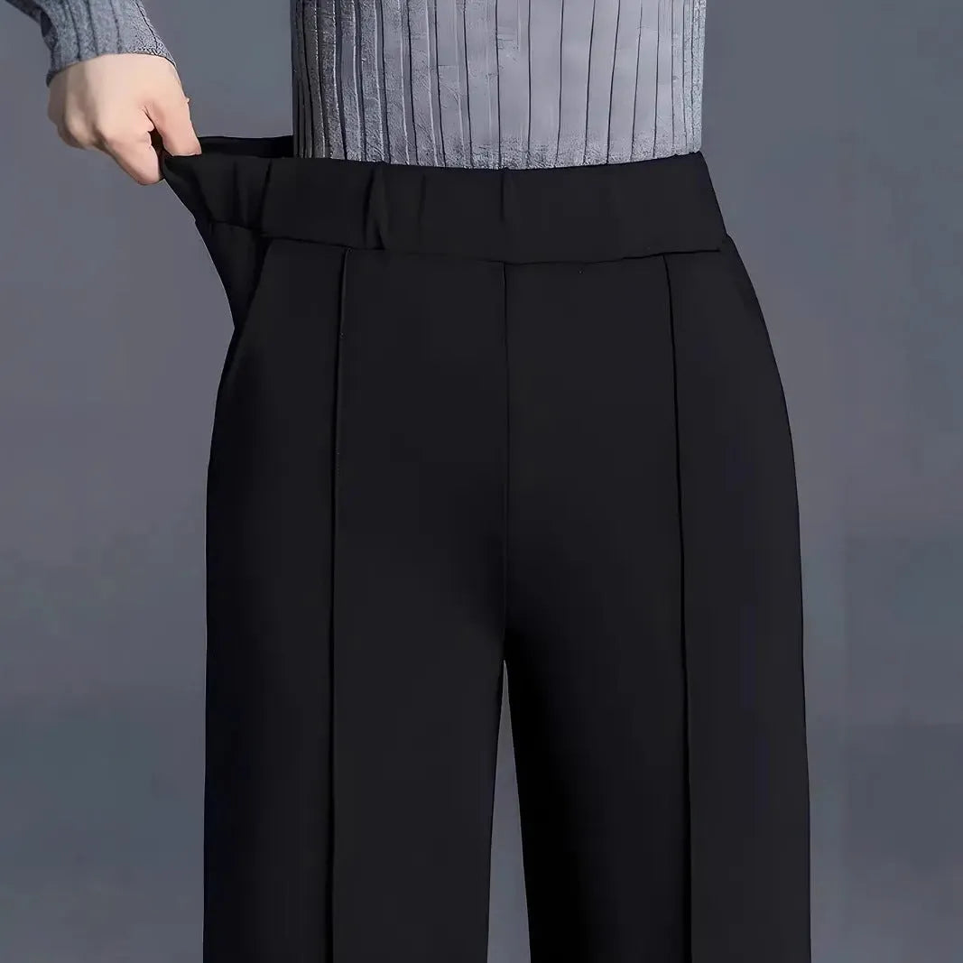Women's high waist wide-leg casual pants with pockets by Nova Mart, shown in a relaxed fit with side pockets and flowy fabric.