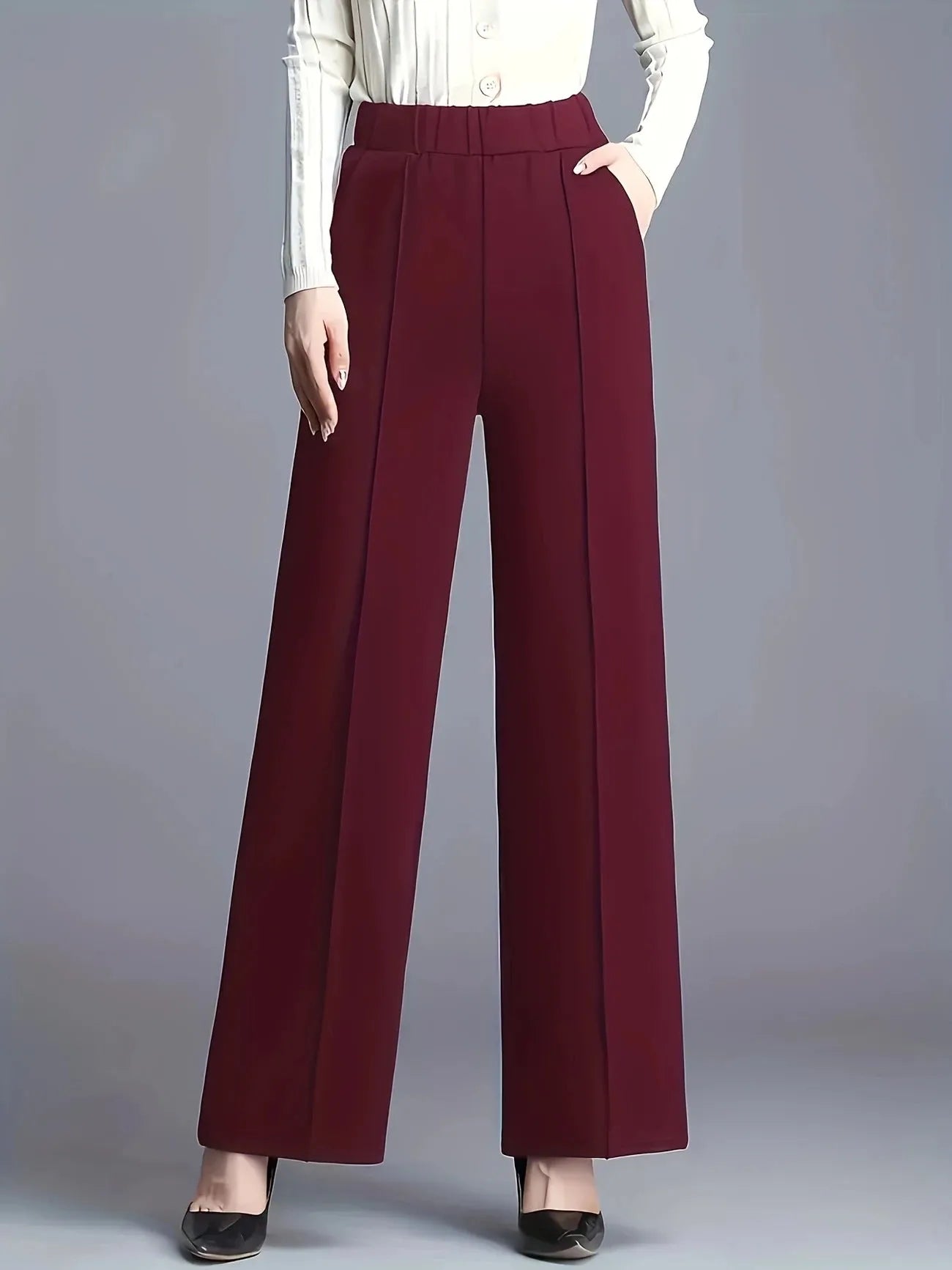 Women's high waist wide-leg casual pants with pockets from Nova Mart, shown in a relaxed fit with side pockets.
