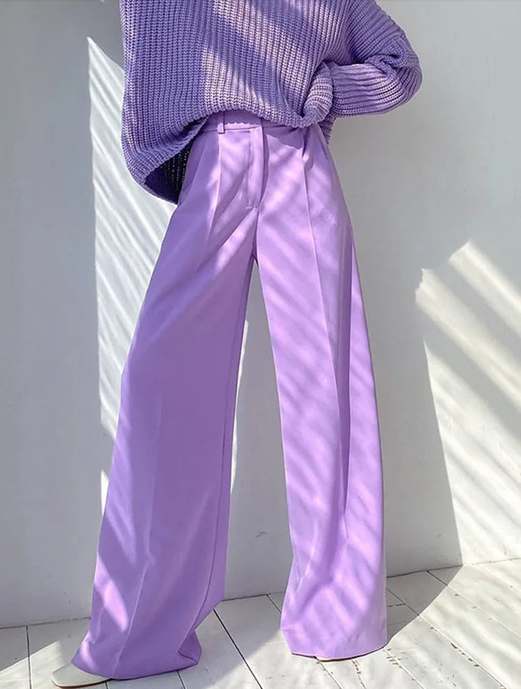 Women's high-waist wide-leg suit pants by Nova Mart, tailored fit with crisp creases and classic style, shown in this image.