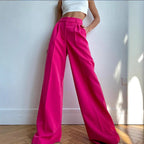 Women's high-waist wide-leg suit pants by Nova Mart, featuring a tailored fit and flowing leg design, shown in a neutral color.
