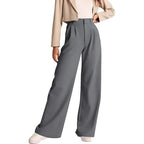 Women's high-waisted casual trousers by Nova Mart, shown in a relaxed fit with belt loops and side pockets.