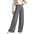 Women's high-waisted casual trousers by Nova Mart, showing a relaxed fit with neutral fabric and stylish waistband.
