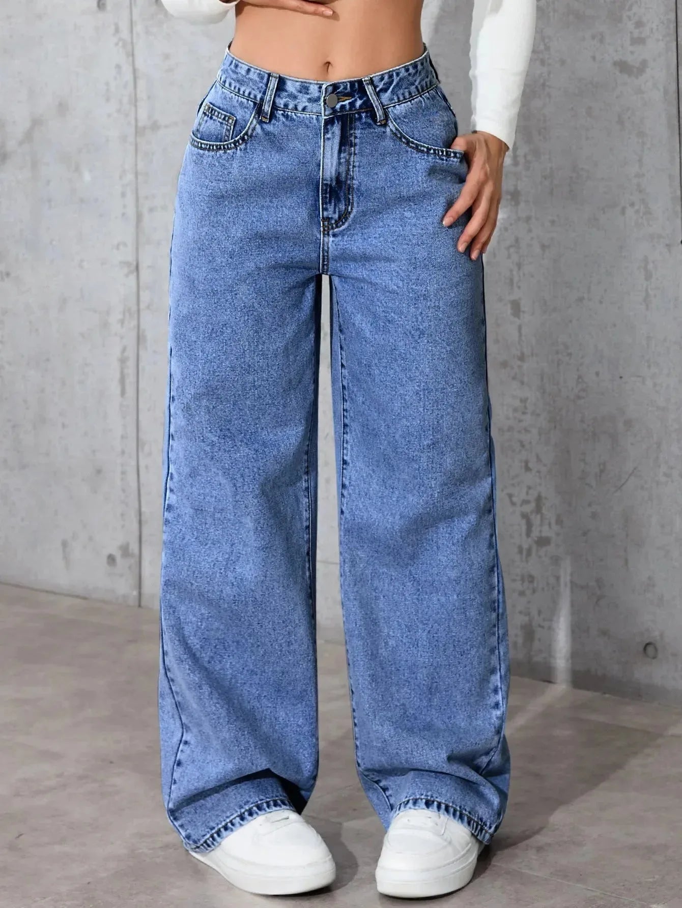 Women's high-waisted straight-leg casual pants by Nova Mart, loose-fitting with a relaxed style, shown on a person.