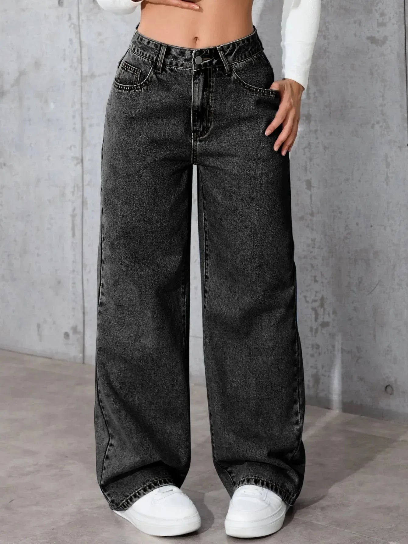 Women's high-waisted straight-leg loose-fit casual pants by Nova Mart displayed on a model, showcasing relaxed fit and comfortable style.