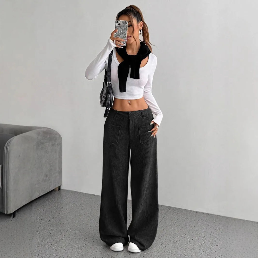 Women's loose fit corduroy wide-leg pants by Nova Mart, showing the relaxed fit and textured fabric in natural light.