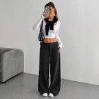 Women's loose fit corduroy wide-leg pants by Nova Mart, showing the relaxed fit and textured fabric in natural light.