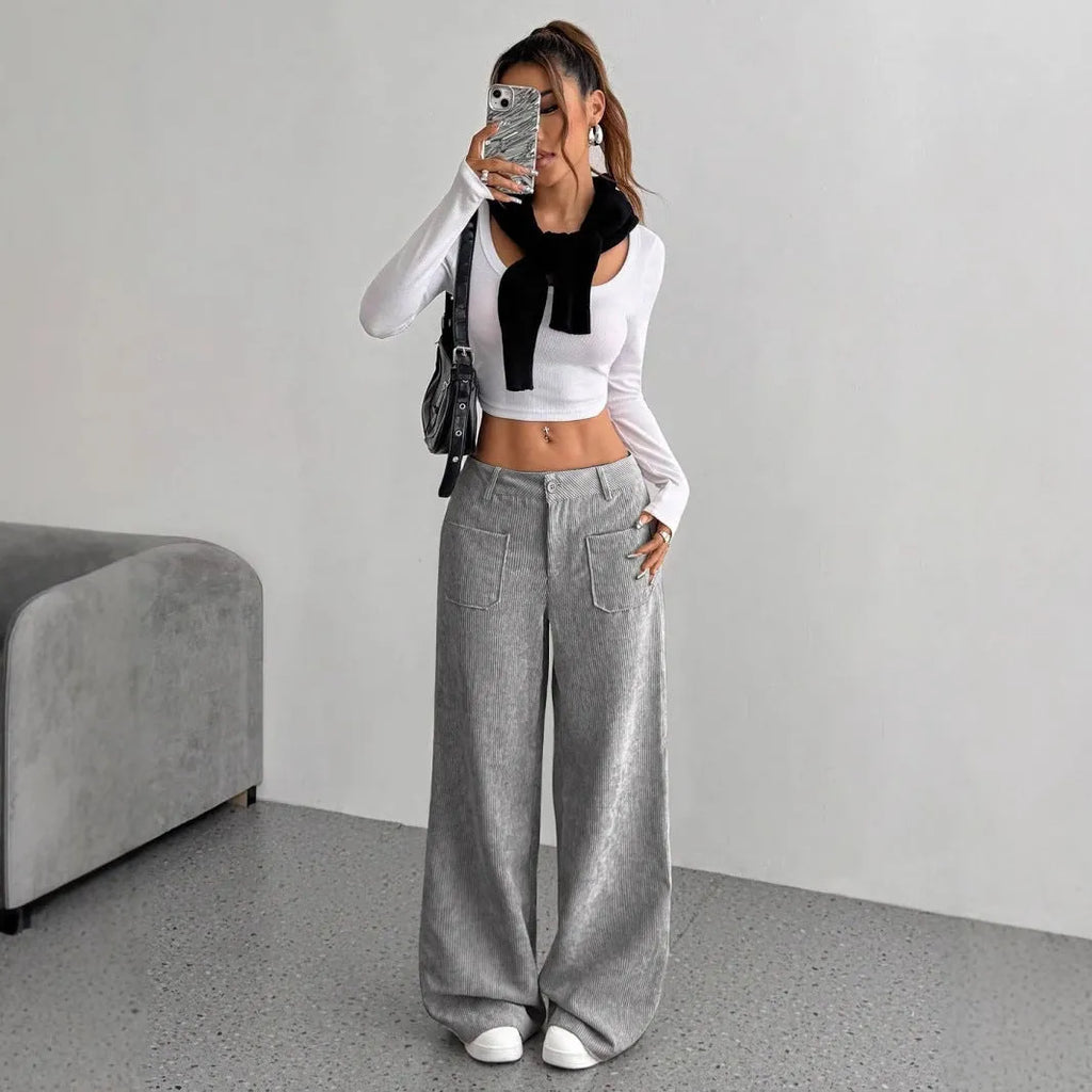 Women's loose corduroy wide-leg pants by Nova Mart, shown in a relaxed fit with a high waist and wide-leg silhouette.