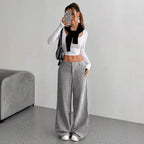 Women's loose corduroy wide-leg pants by Nova Mart, shown in a relaxed fit with a high waist and wide-leg silhouette.