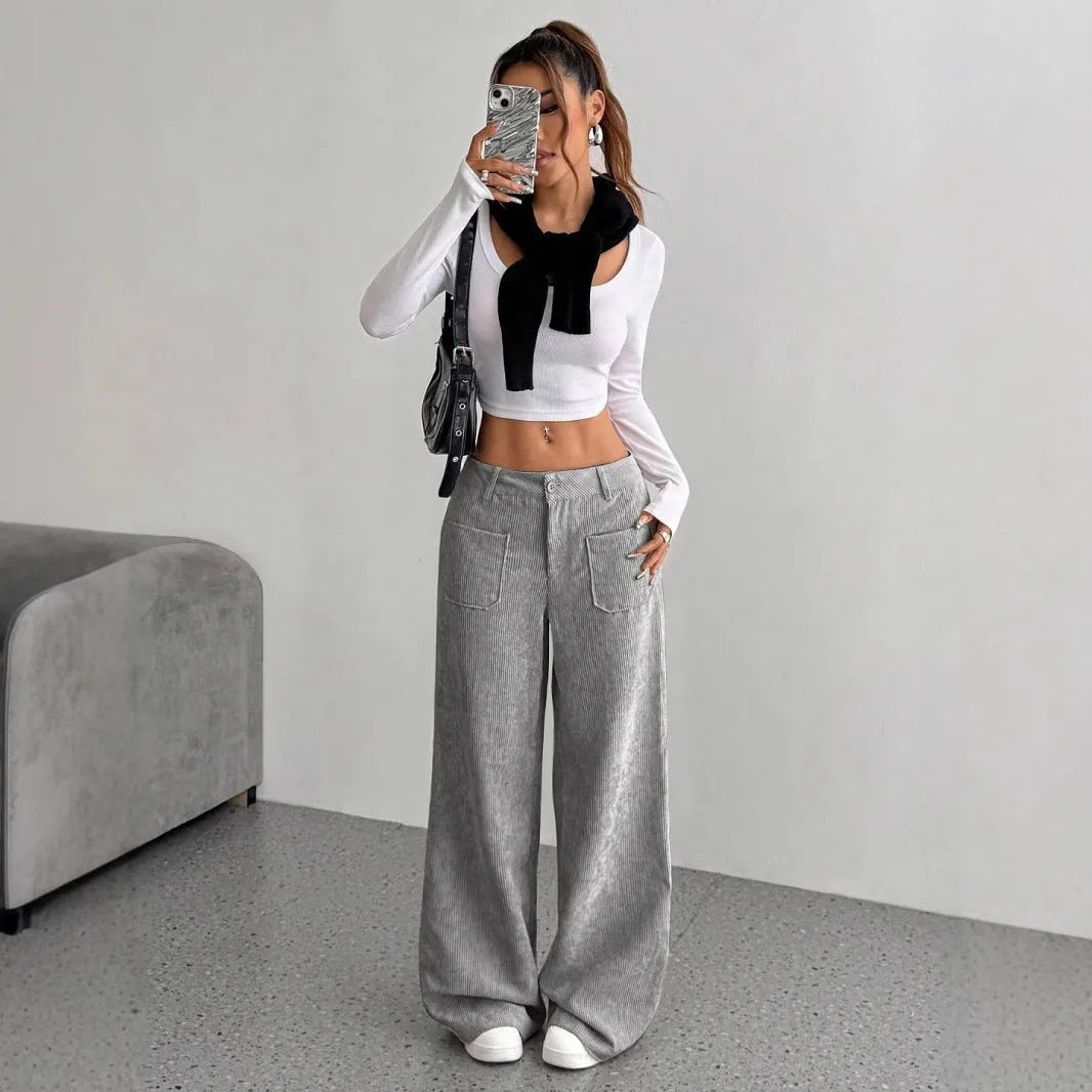 Women's loose corduroy wide-leg pants by Nova Mart, shown in a relaxed fit with a high waist and wide-leg silhouette.