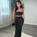Women's midriff-baring tube top and skirt set by Nova Mart, featuring a stylish matching clothing ensemble on a woman.