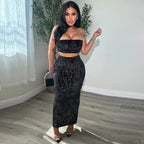 Women's midriff-baring tube top and skirt set by Nova Mart, featuring a stylish matching outfit with a fitted top and flowy skirt.