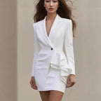 Women's blazer dress with notch lapel and wooden trim earrings, stylish Nova Mart outfit for elegant occasions.