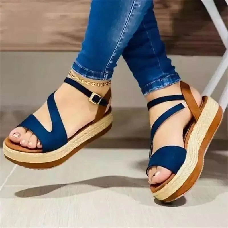 Women's platform sandals with hollow buckle design by Nova Mart, featuring chunky heels and open toe style.