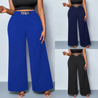 Plus size women's metal buckle trousers by Nova Mart featuring stylish metal buckle details and a comfortable fit.