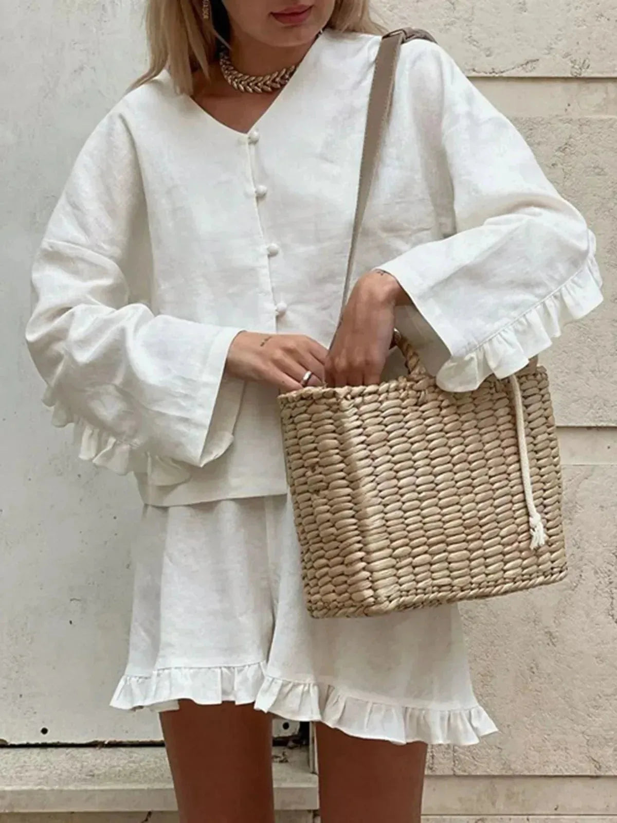 Women's ruffle-trim shorts casual two-piece set by Nova Mart, featuring lightweight fabric and stylish ruffle details.