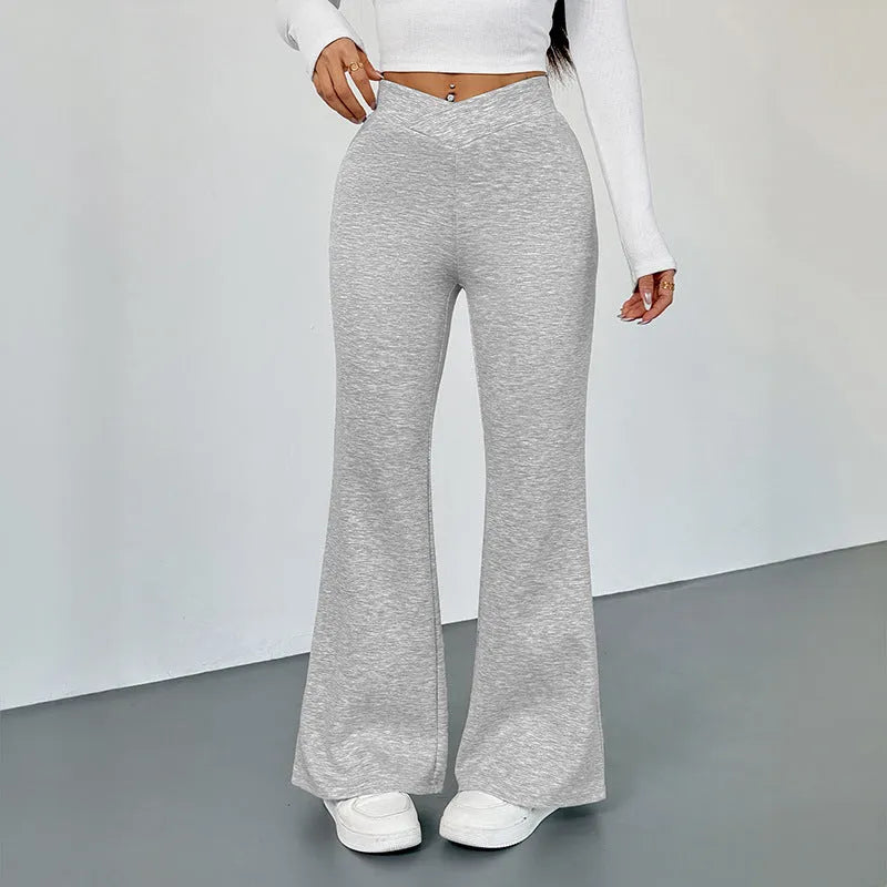 Women's slim fit bootcut trousers by Nova Mart, shown in navy blue with a tailored waistband and classic pant silhouette.