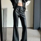 Women's slim fit leather bootcut trousers by Nova Mart, showcased on a model, featuring sleek leather fabric and tailored fit.