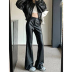Women's slim fit leather bootcut trousers from Nova Mart, showcasing tailored black pants with a smooth leather finish.