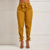 Women's slim-fit tailored pants by Nova Mart, featuring a sleek design and classic fit, shown on a neutral background.