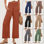 Women's solid-color cropped high-waist pants by Nova Mart, shown in neutral fabric with a relaxed fit and high-rise waist.