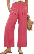 Women's solid-color cropped high-waist pants by Nova Mart, shown in beige with a relaxed fit and tailored waistband.