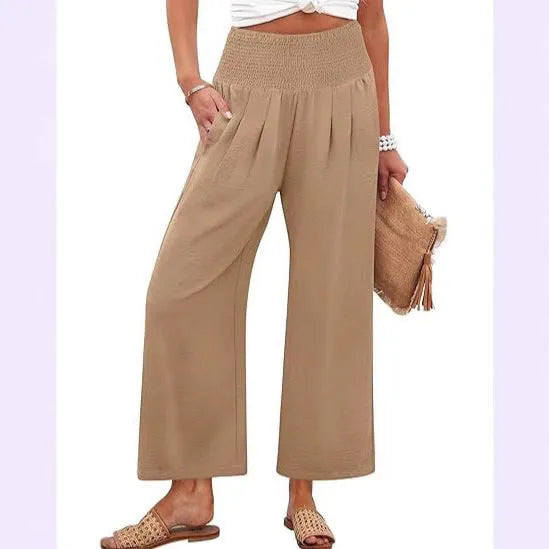 Women's solid-color cropped high-waist pants by Nova Mart, shown in a relaxed fit on a model.