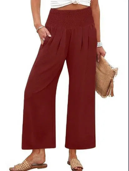 Women's solid-color cropped high-waist pants from Nova Mart, featuring a stylish fit and comfortable design.