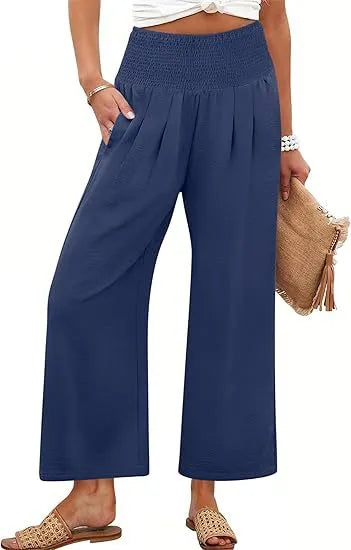 Women's solid-color cropped high-waist pants by Nova Mart, shown in a neutral tone, featuring a fitted high waistband and cropped length.
