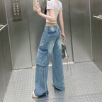 Women's straight-leg floor-length pants by Nova Mart with large pockets, featuring a sleek and comfortable design.