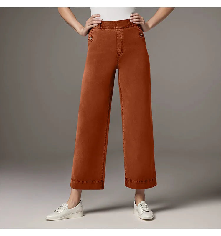 Women's straight-leg wide-leg cropped jeans by Nova Mart, showing light wash denim with frayed hems and classic five-pocket style.