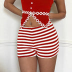 Women's striped low-waist high-stretch shorts from Nova Mart, showing the fitted design and colorful horizontal stripe pattern.