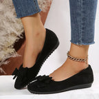Plus size women's suede bow Gommino flat shoes by Nova Mart, featuring a stylish design and comfortable slip-on fit.