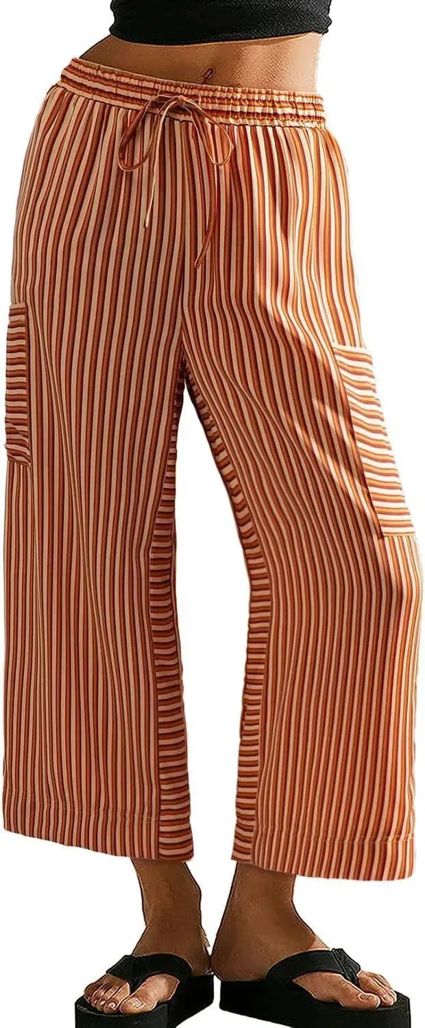 Women’s summer striped straight-leg pants by Nova Mart, featuring lightweight fabric and casual fit, displayed on a hanger.