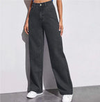 Women's washed straight-leg jeans by Nova Mart displayed on a model, showcasing a casual fit and distressed denim style.