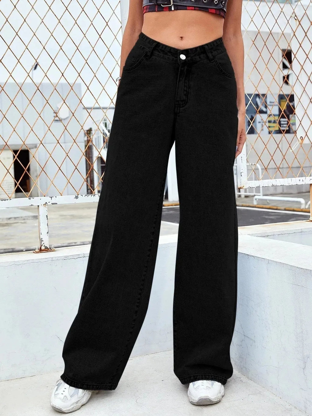 Women's washed straight-leg jeans by Nova Mart, showing fit and faded denim texture on a casual style.
