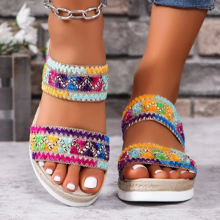 Women's woven wedge sandals with ethnic style wide straps and a cork heel, designed by Nova Mart.